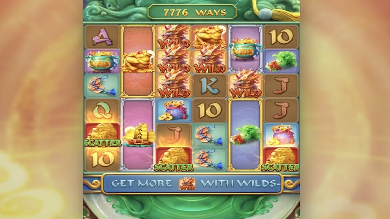 Slot reels with wild dragon symbols and scatter icons